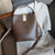 First-Layer Cowhide Leather Bucket Bag – Stylish & Functional Handbag