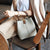 First-Layer Cowhide Leather Bucket Bag – Stylish & Functional Handbag